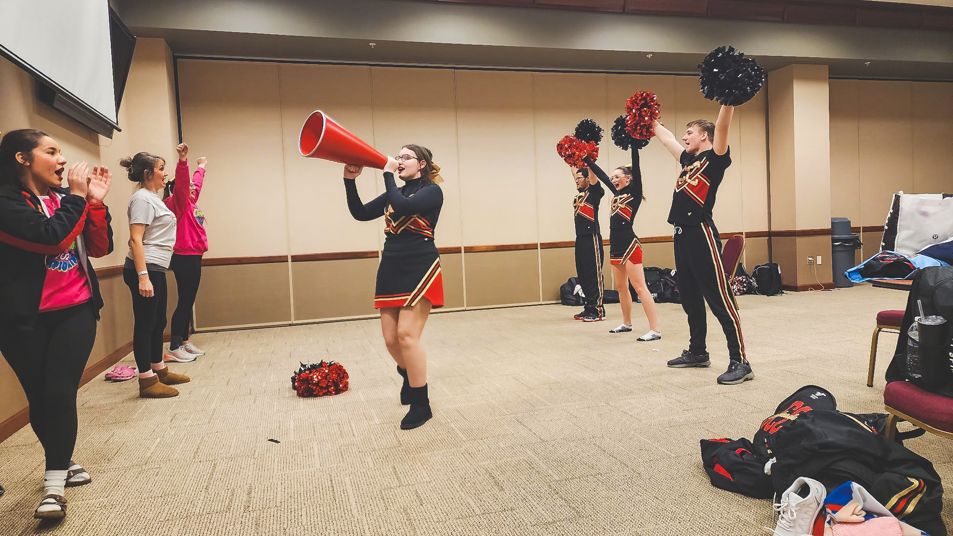 The JCC Unified Cheer Team practices prior to preforming their Sideline routine at State Cheer.