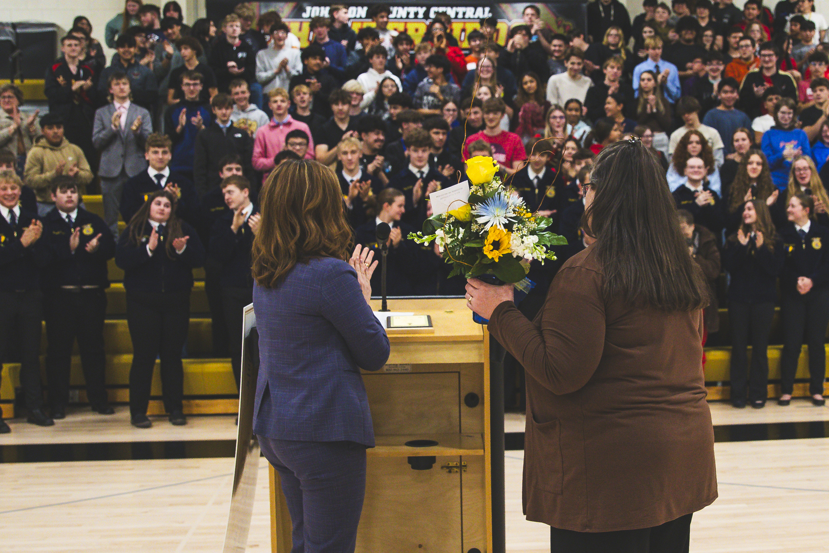 Mrs. Hodges receiving a standing ovation 