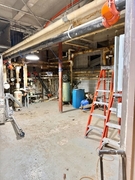 Lower level machine room after old HVAC unit was removed.