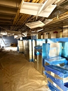 Lower level classroom with ductwork ready to be installed.
